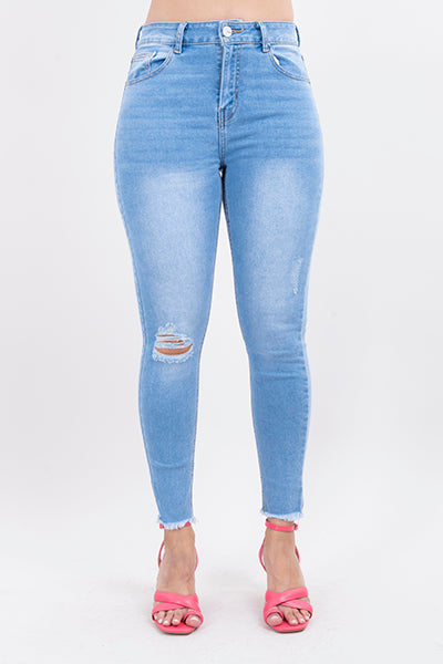 Jeans skinny con destrucción en rodilla