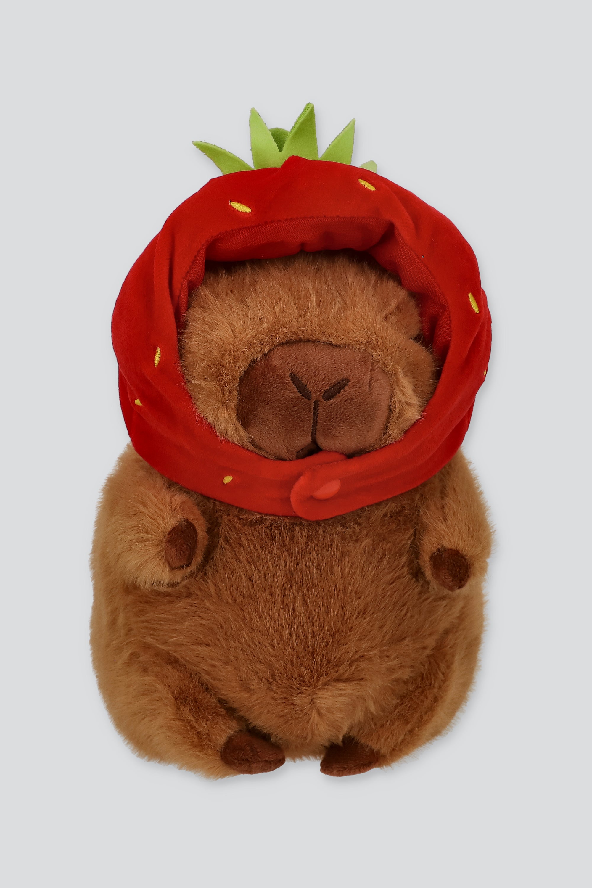 Peluche capibara gorro fresa