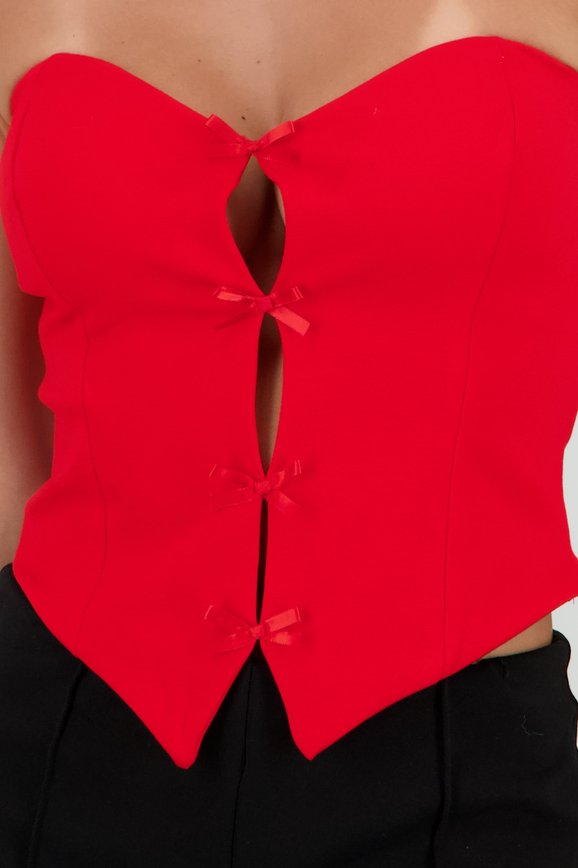 Top strapless detalle moños