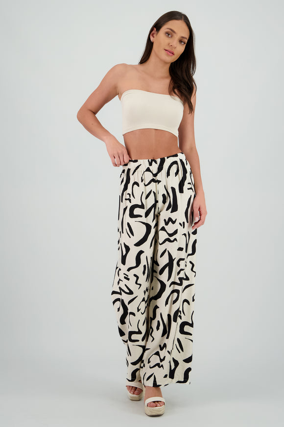 Pantalon fluido detalle estampado