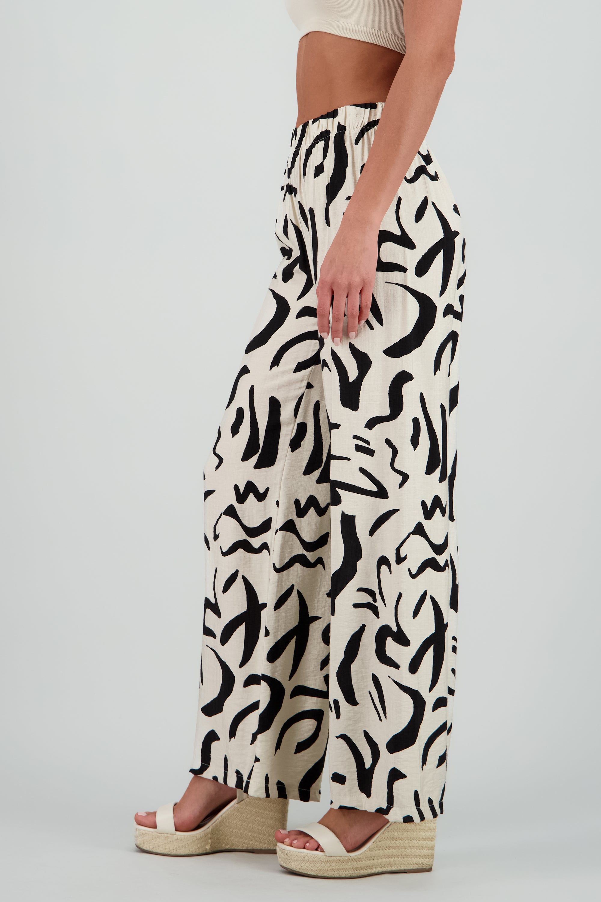 Pantalon fluido detalle estampado