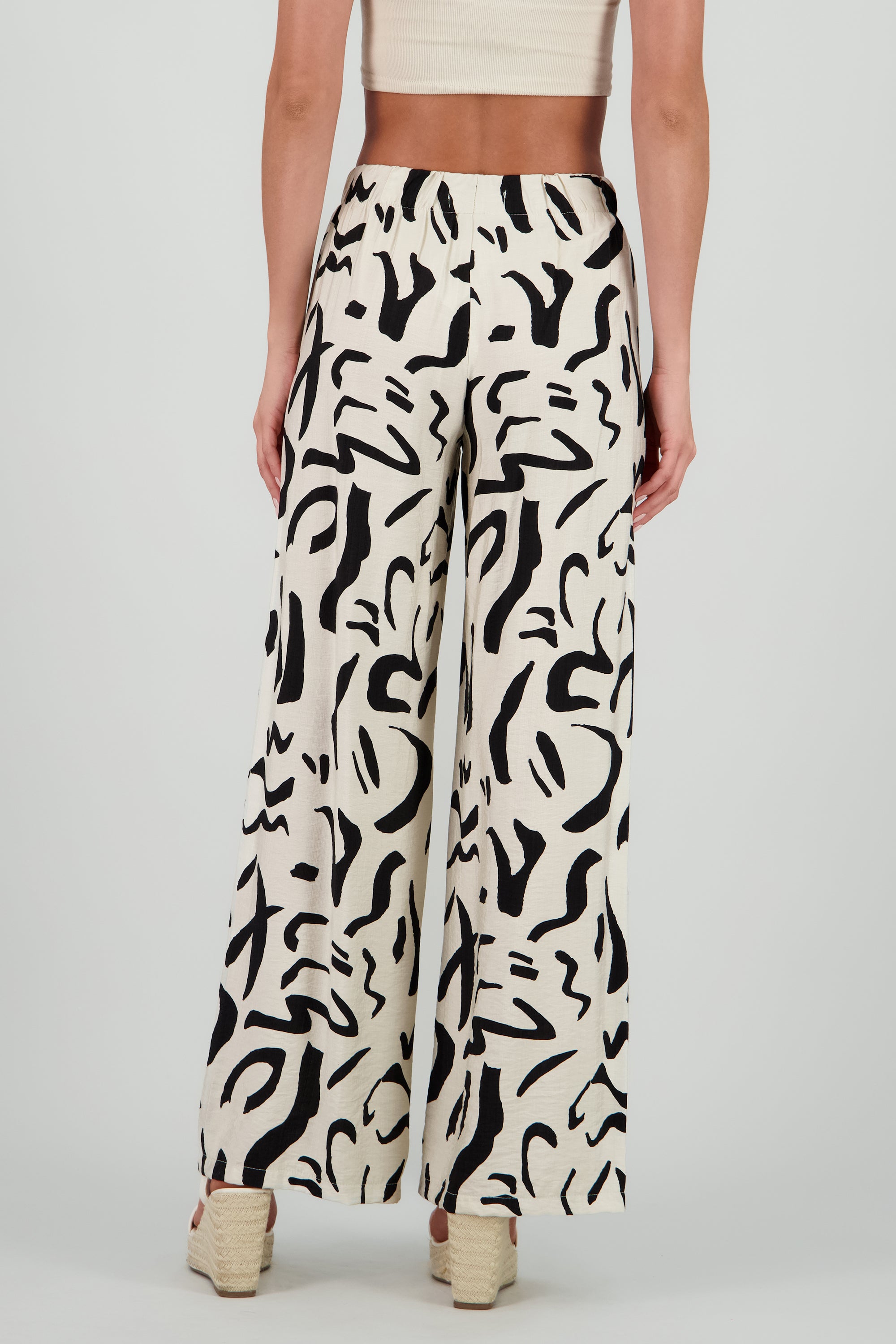 Pantalon fluido detalle estampado