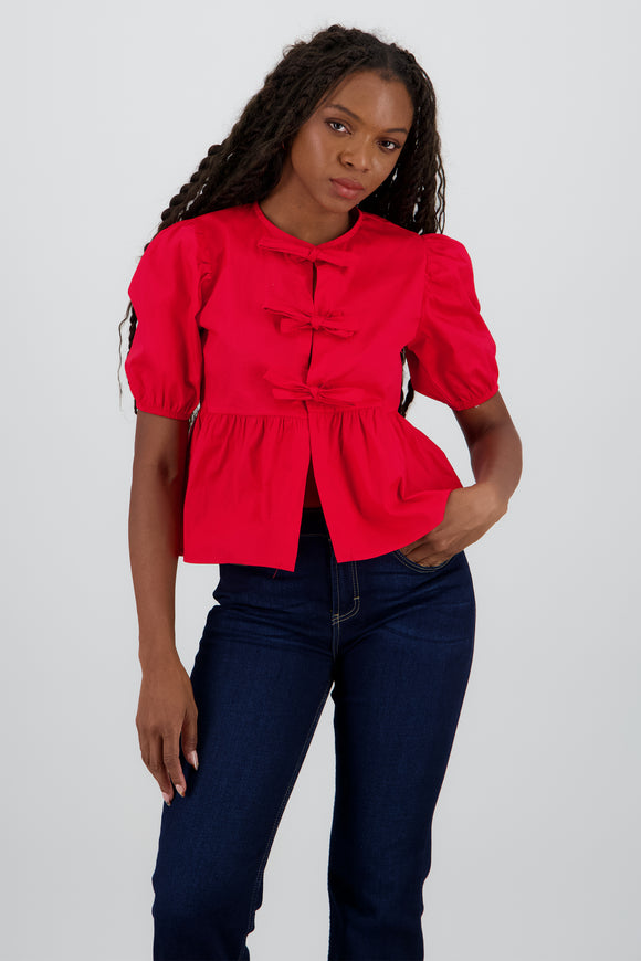 Blusa mangas abullonadas detalle moños