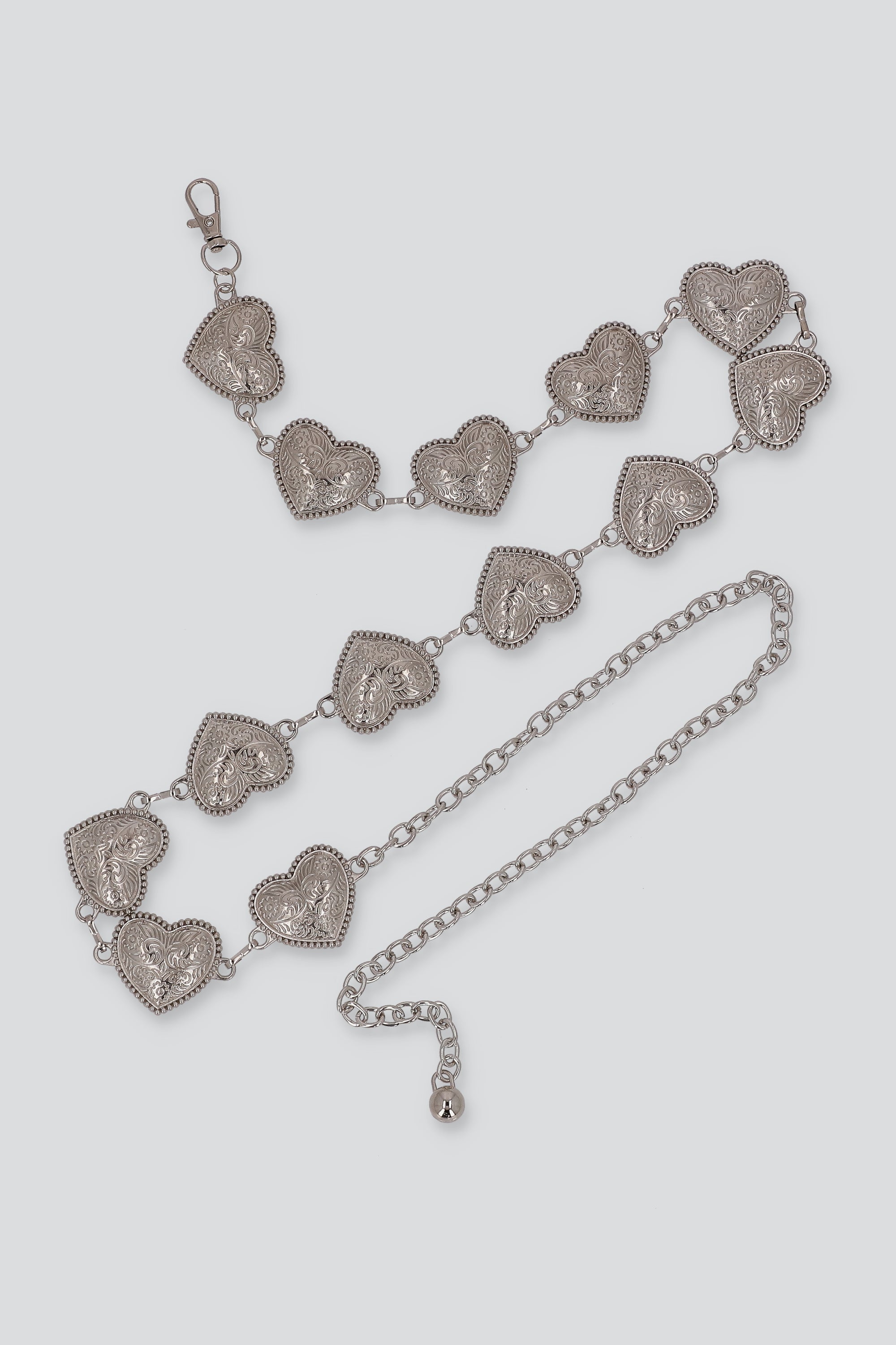 Cinturón cadena corazones boho