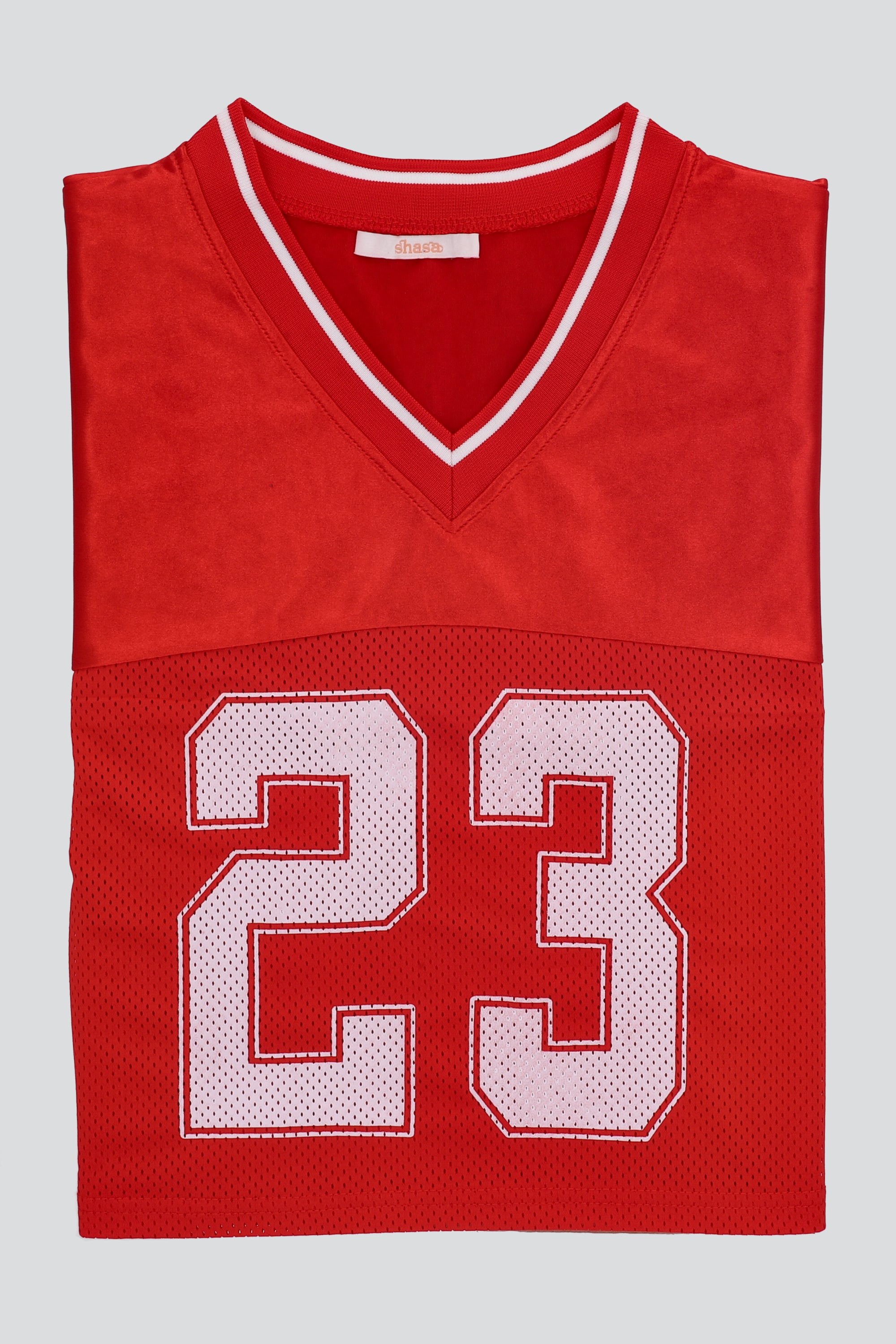 Top tipo jersey deportiva crop