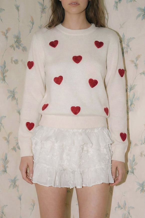 Suéter de corazones