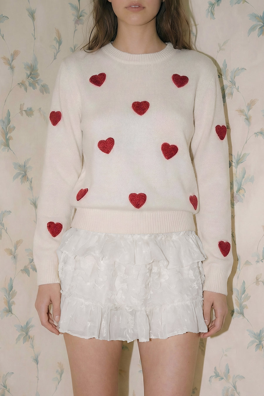 Suéter de corazones
