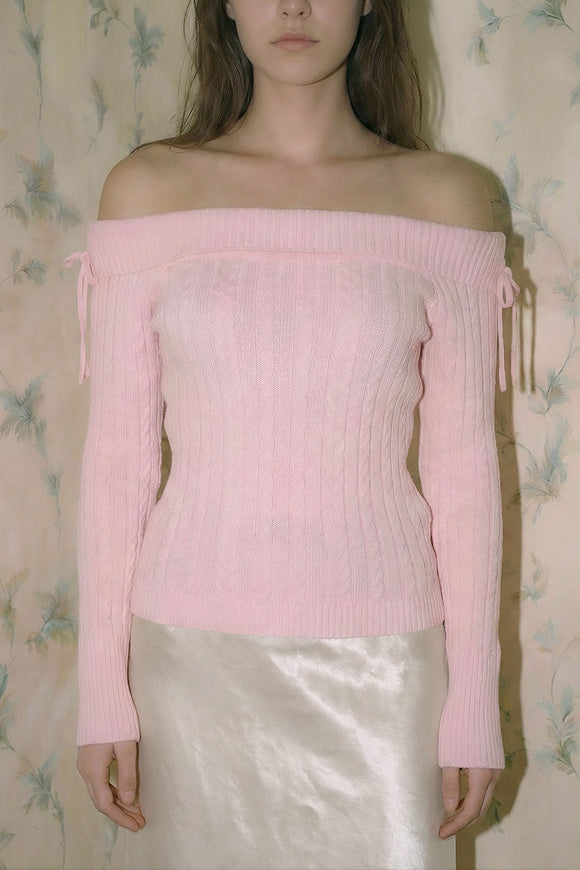 Suetere sin hombros trenzado con amarre moños