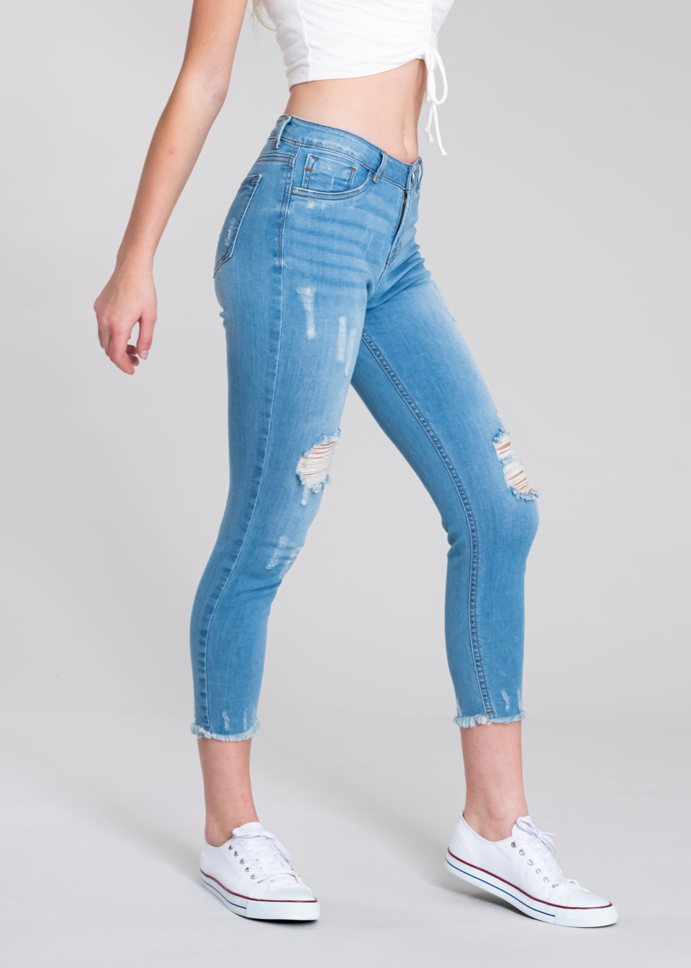 Jeans cintura media destrucciones flecos AZUL