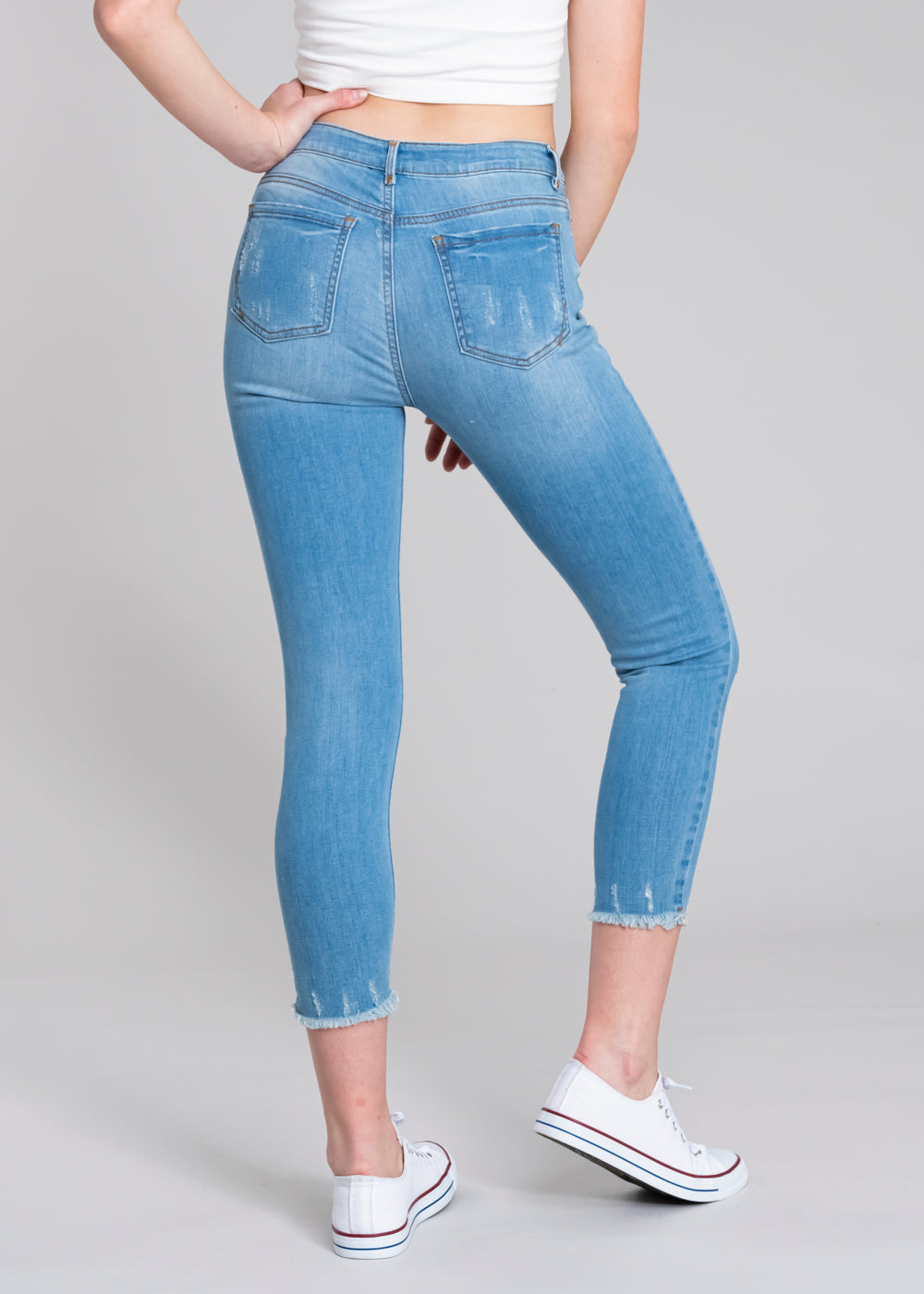 Jeans cintura media destrucciones flecos AZUL