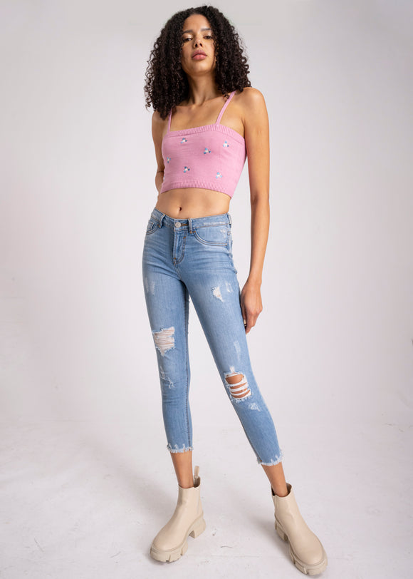 Jeans cintura media destrucciones flecos