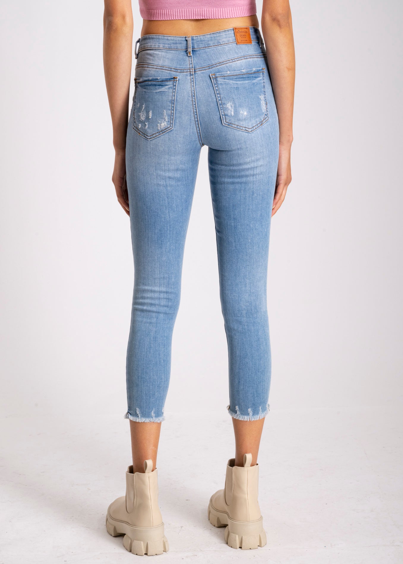 Jeans cintura media destrucciones flecos AZUL