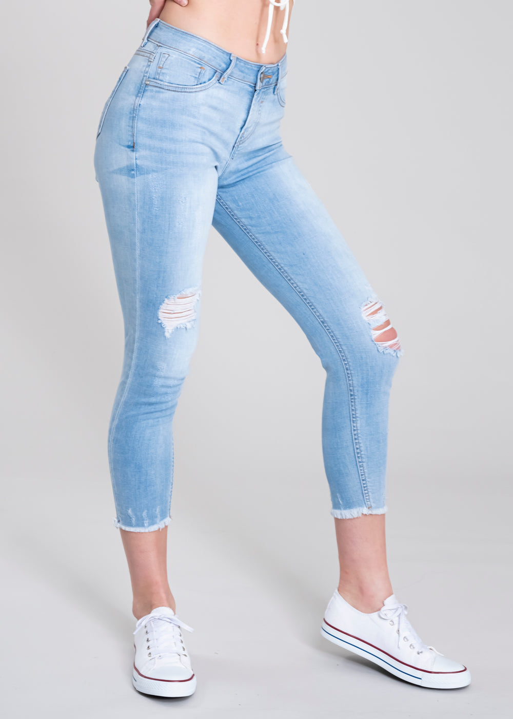 Jeans cintura media destrucciones flecos LIGHT WASH