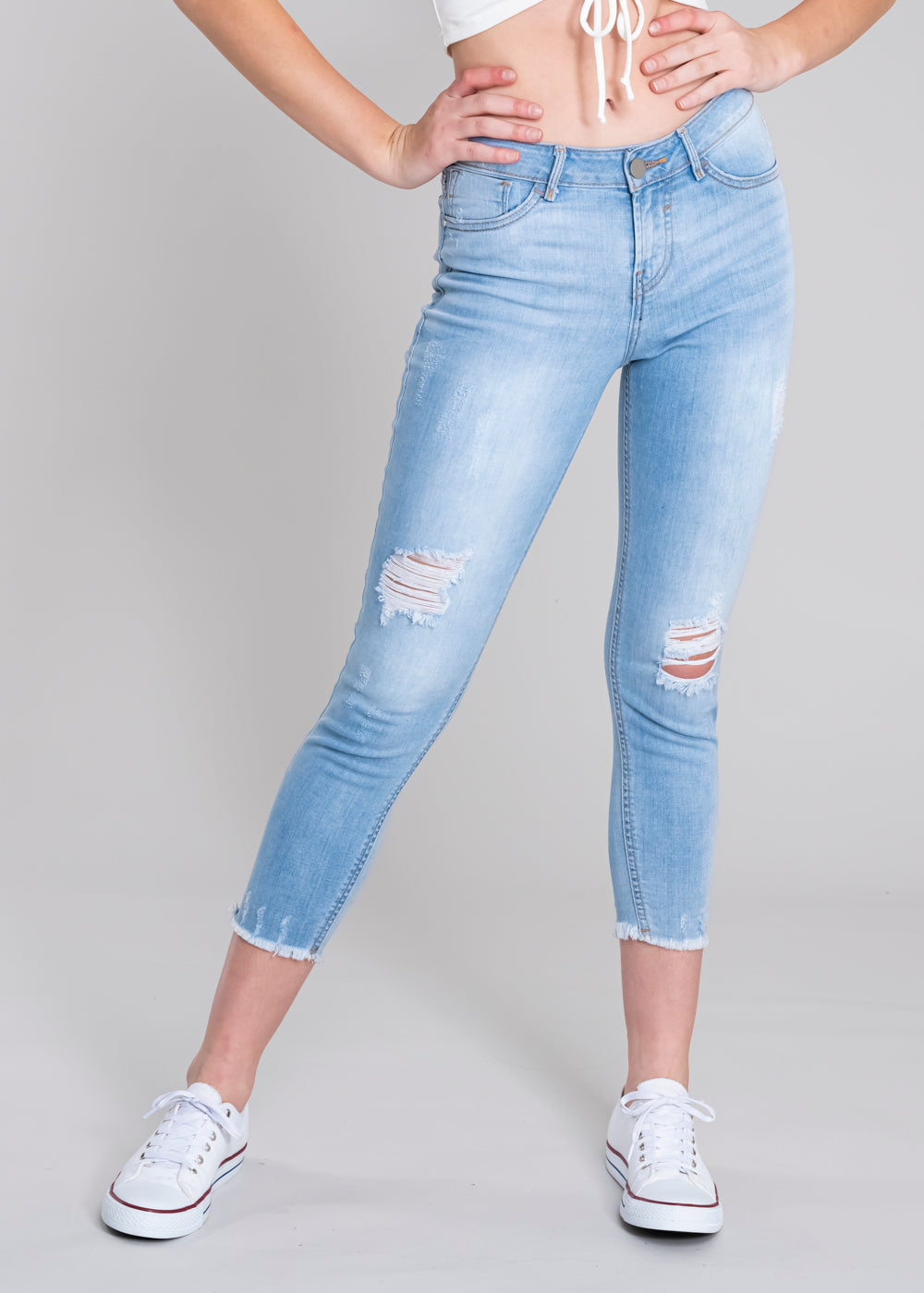 Jeans cintura media destrucciones flecos LIGHT WASH