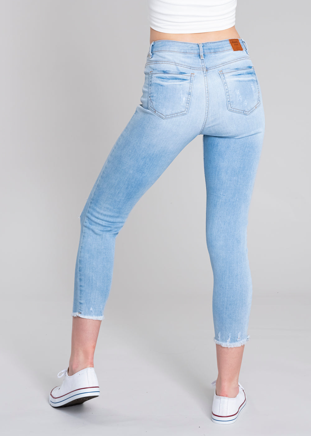 Jeans cintura media destrucciones flecos LIGHT WASH