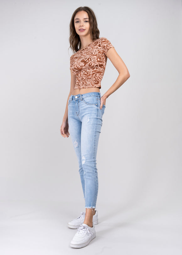 Jeans cintura media destrucciones flecos