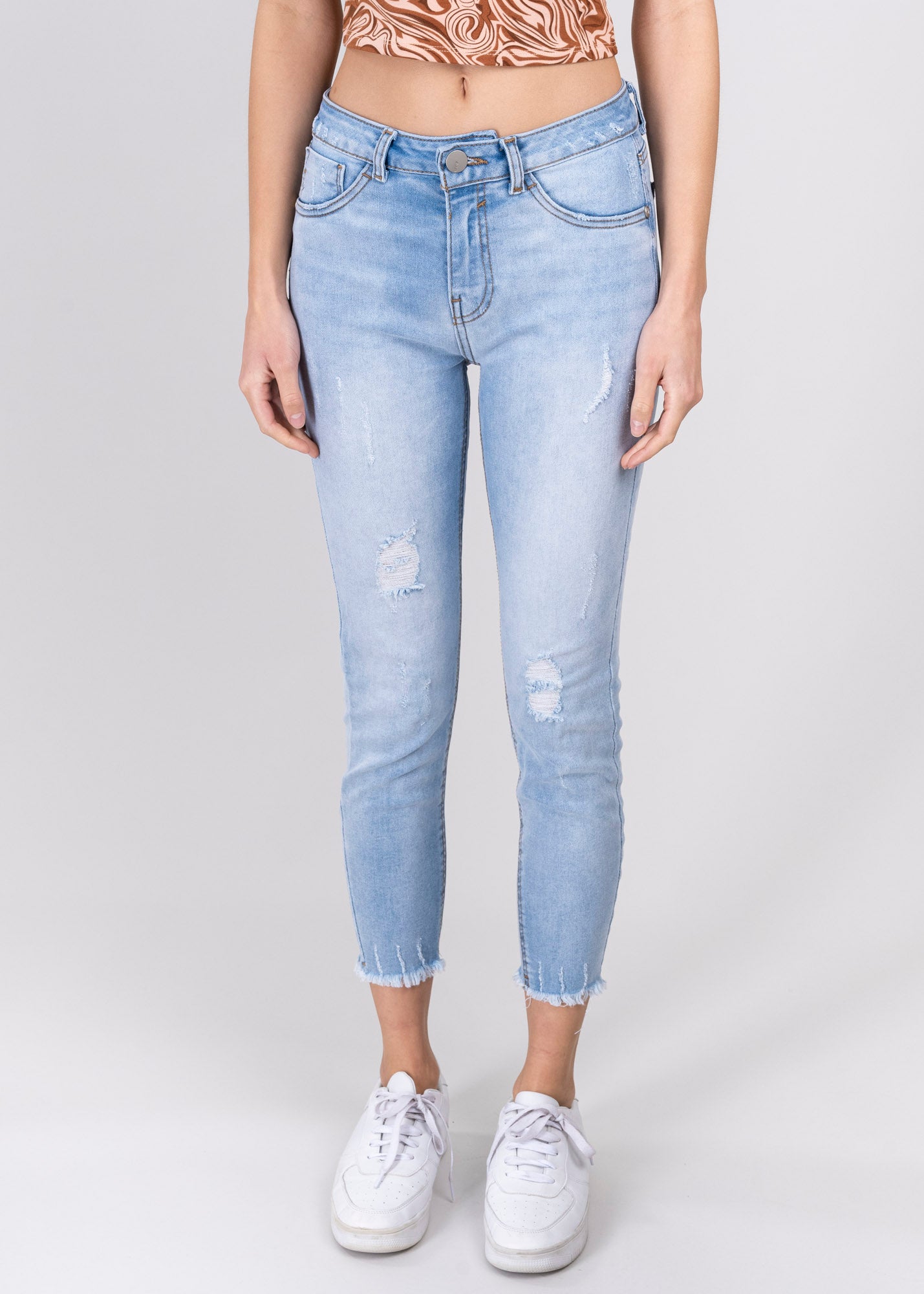 Jeans cintura media destrucciones flecos LIGHT WASH