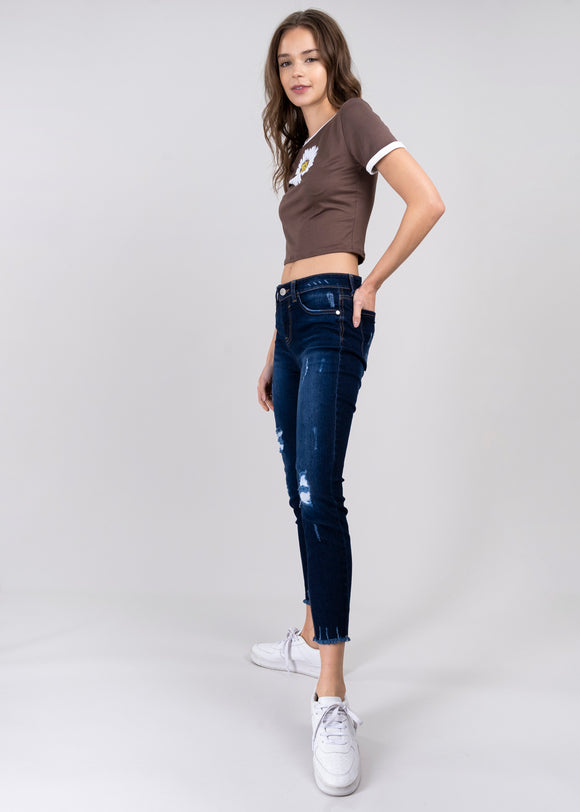 Jeans cintura media destrucciones flecos