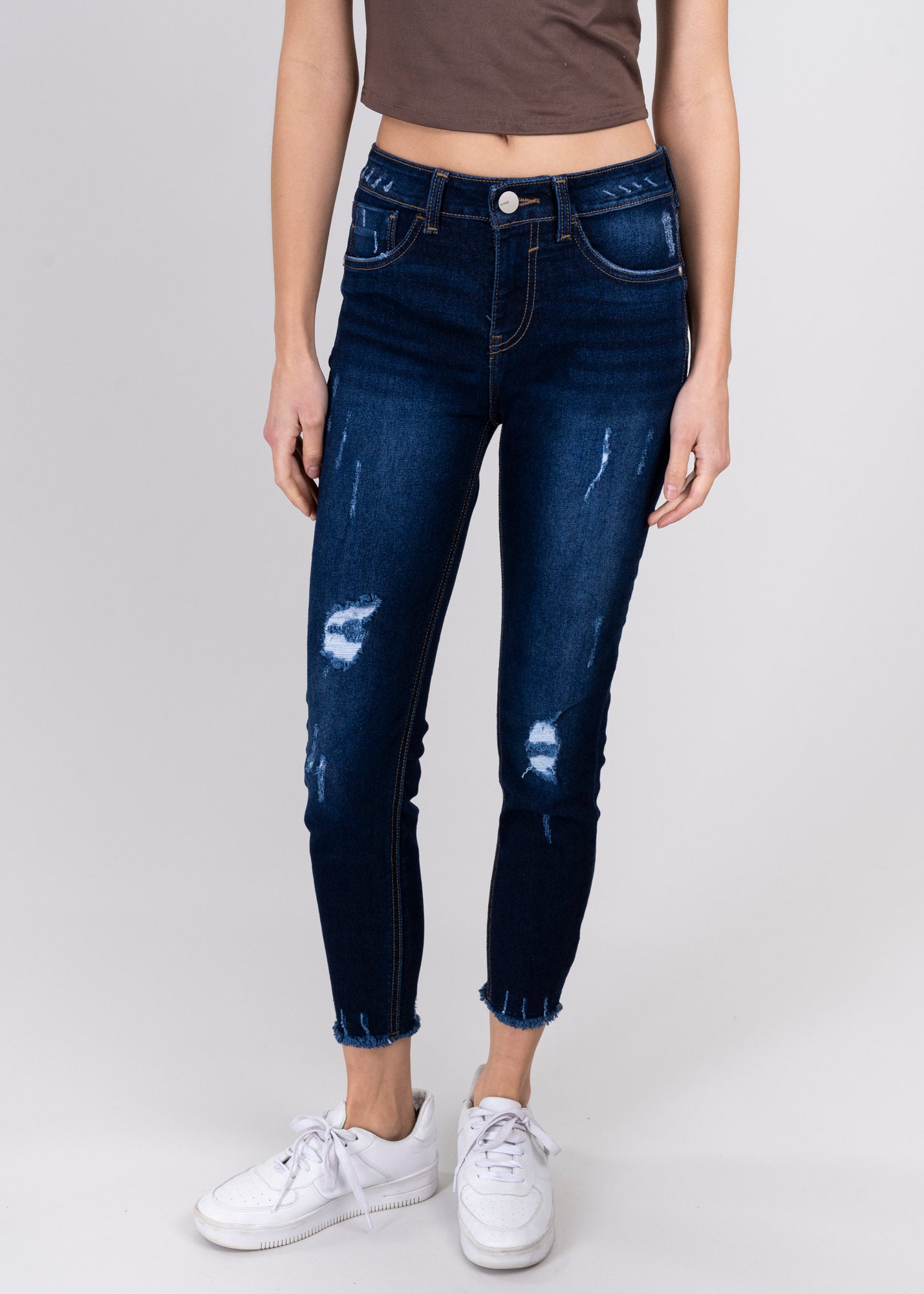 Jeans cintura media destrucciones flecos RINSE