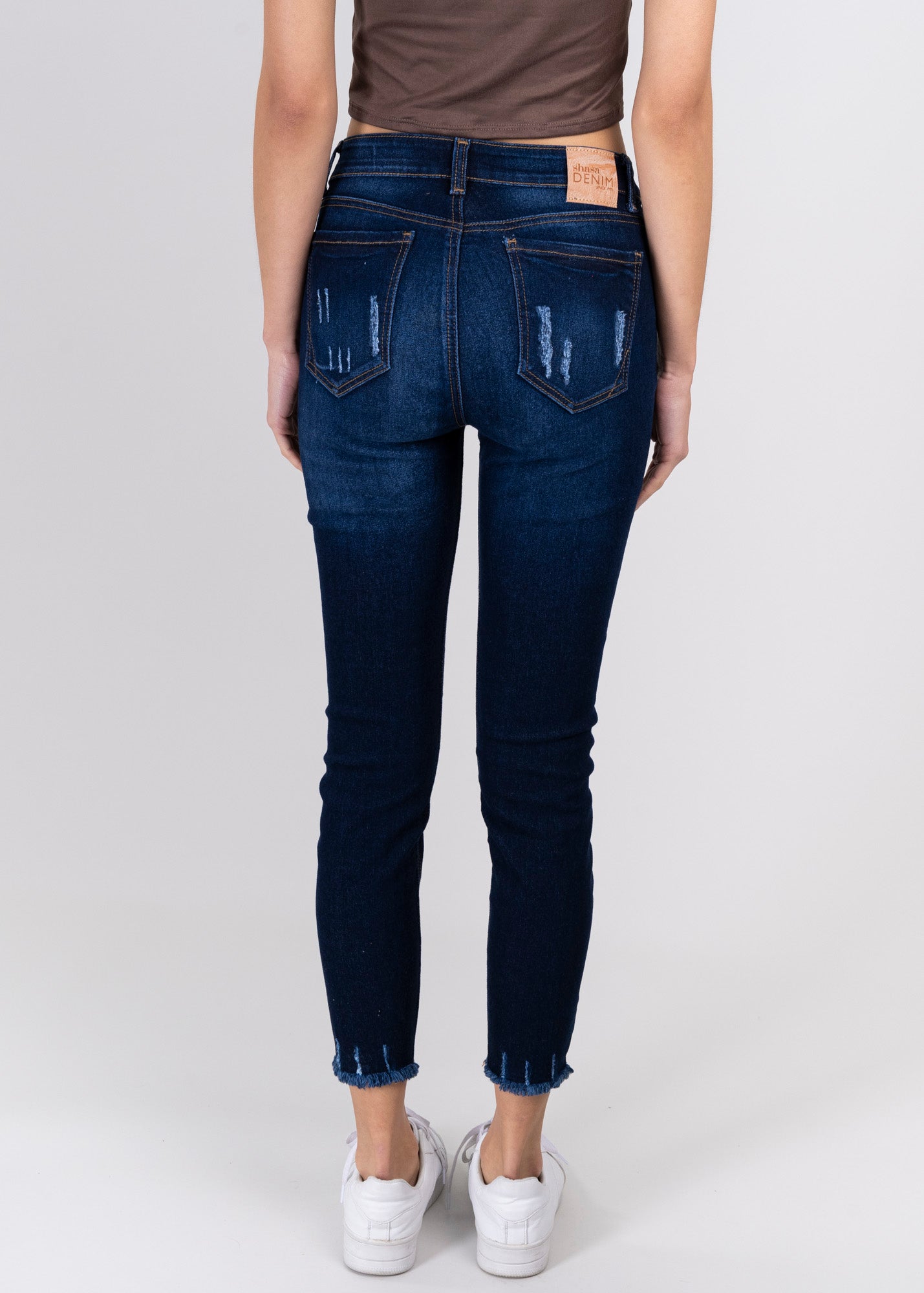 Jeans cintura media destrucciones flecos RINSE
