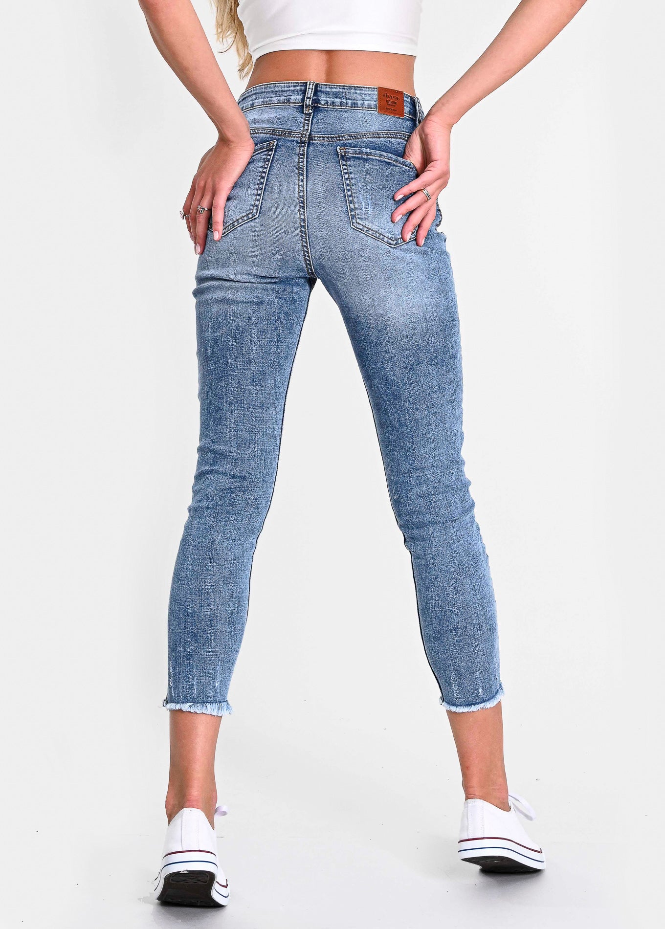 Jeans cintura media destrucciones flecos ACID WASH