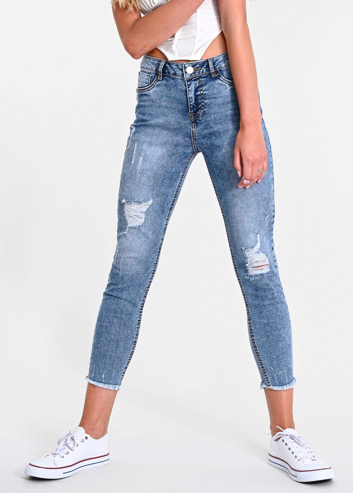 Jeans cintura media destrucciones flecos ACID WASH