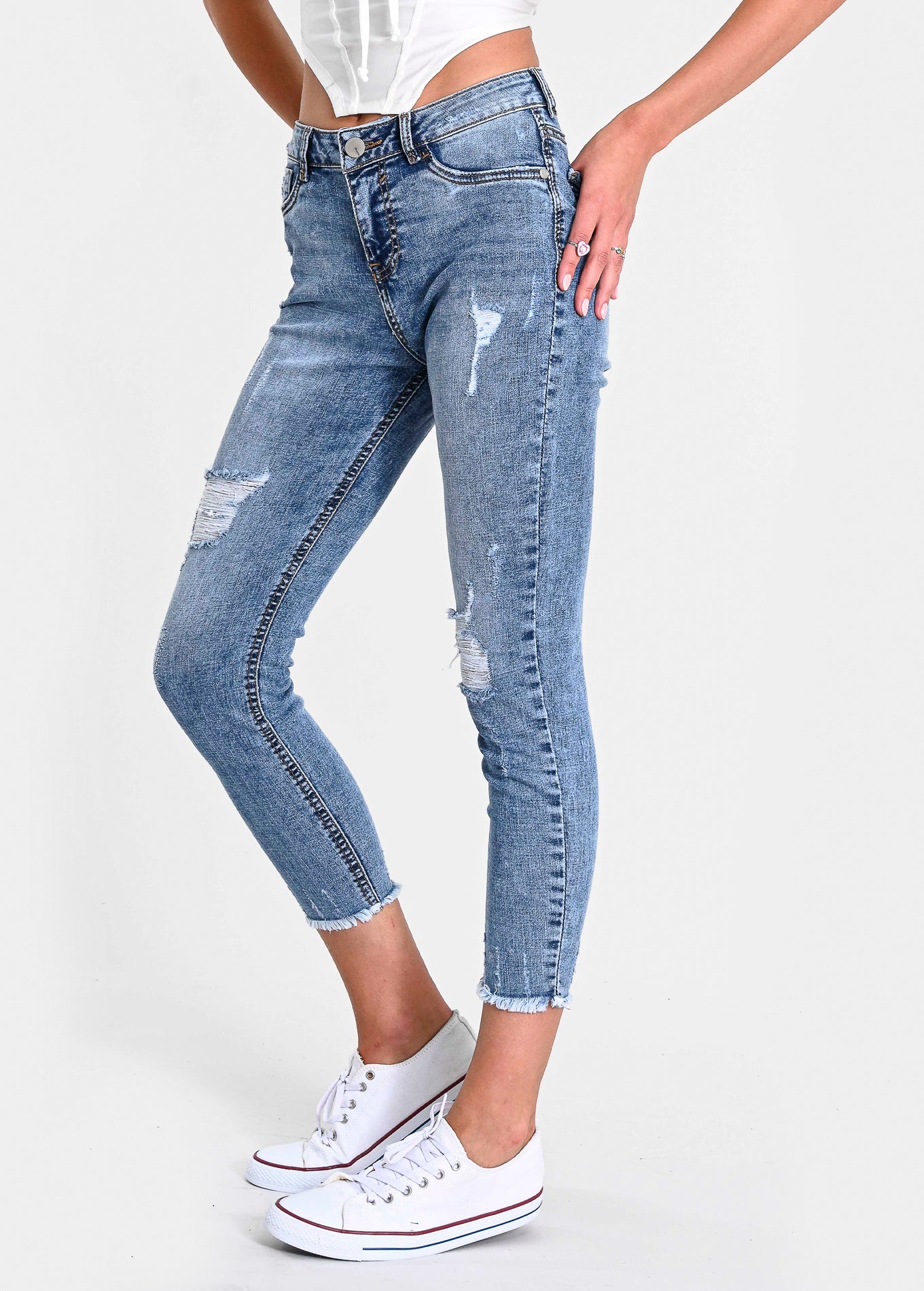 Jeans cintura media destrucciones flecos ACID WASH