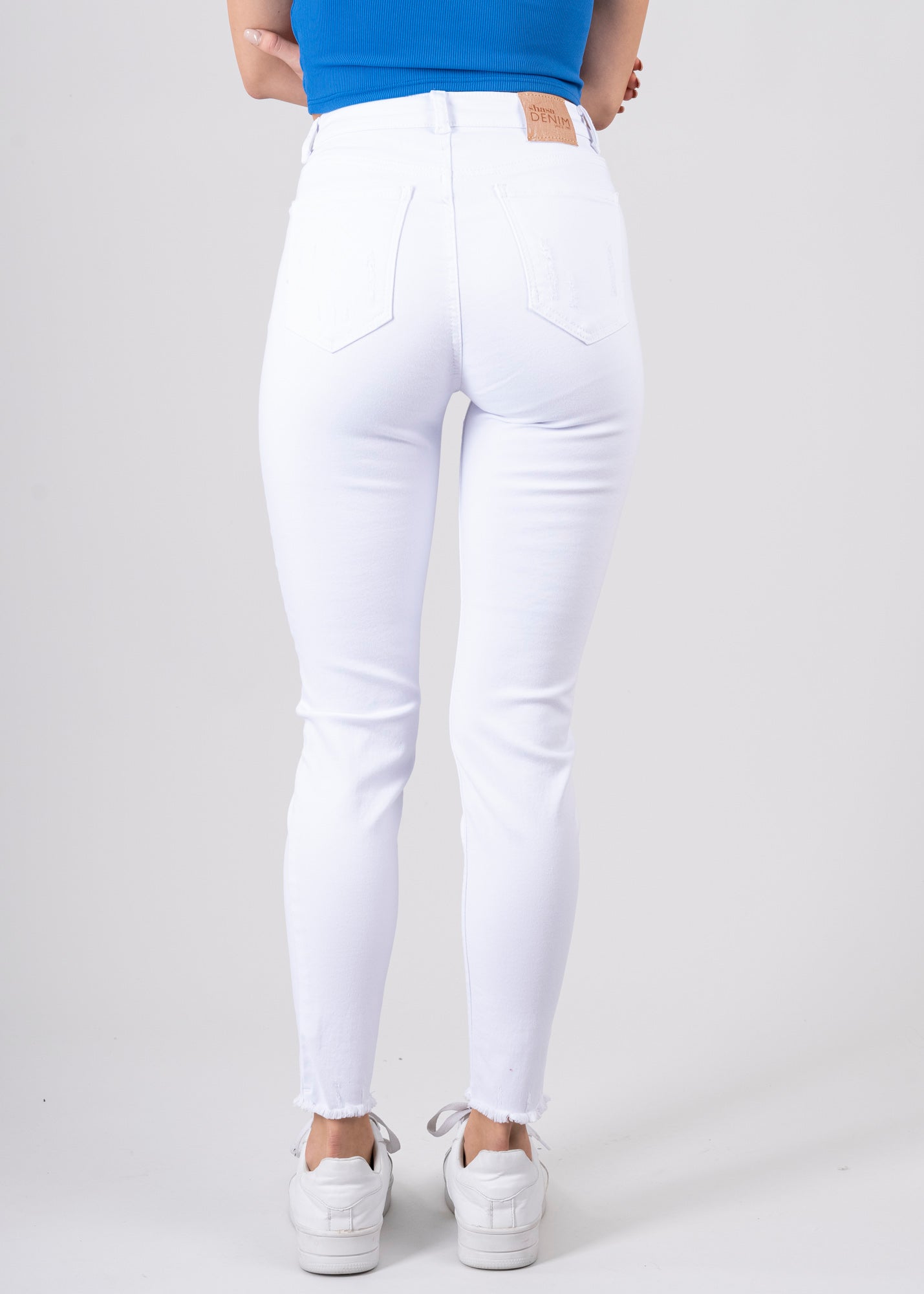 Jeans cintura media destrucciones flecos BLANCO