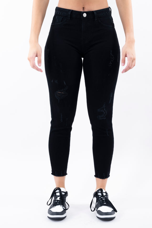 Jeans cintura media destrucciones flecos