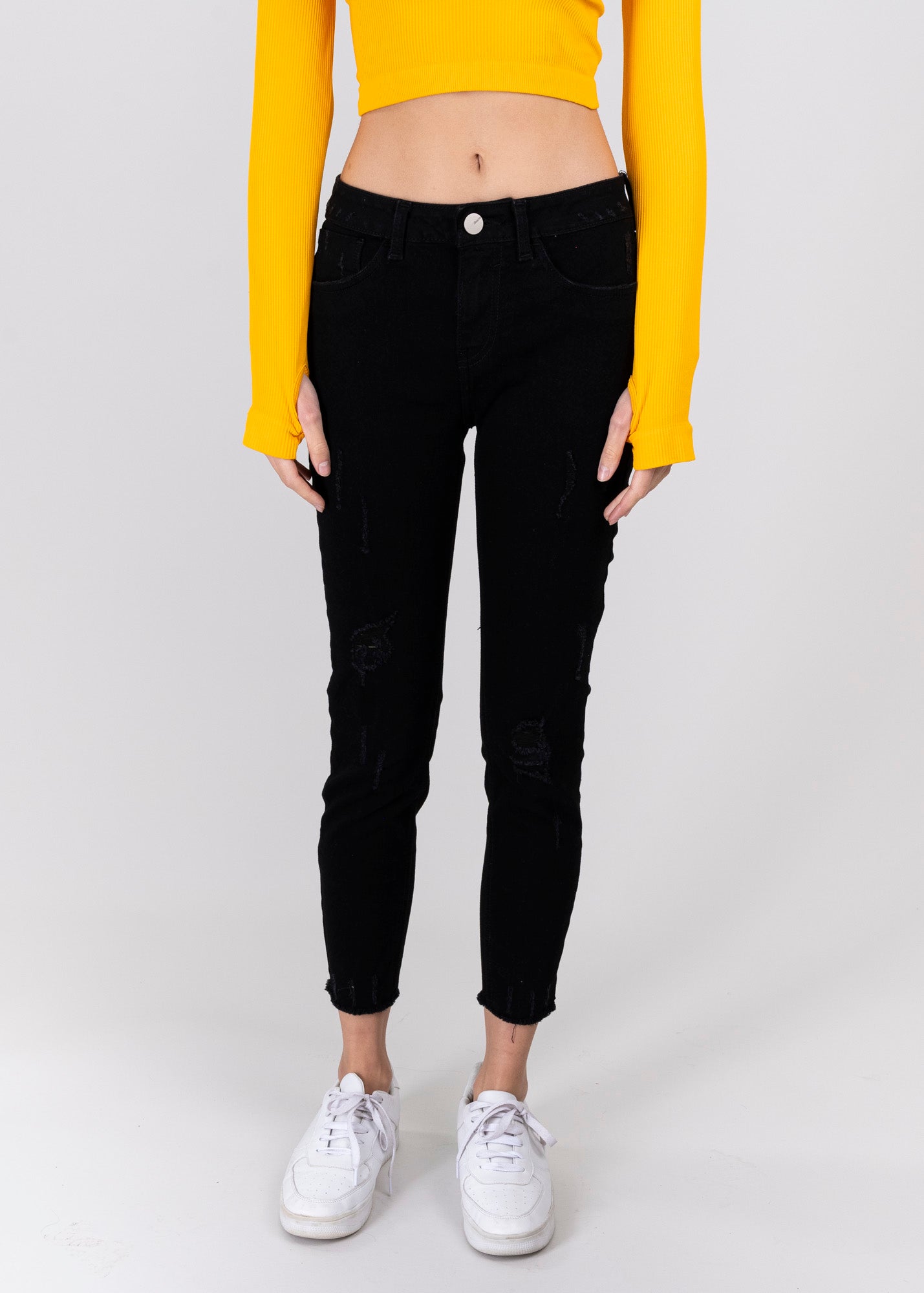 Jeans cintura media destrucciones flecos NEGRO