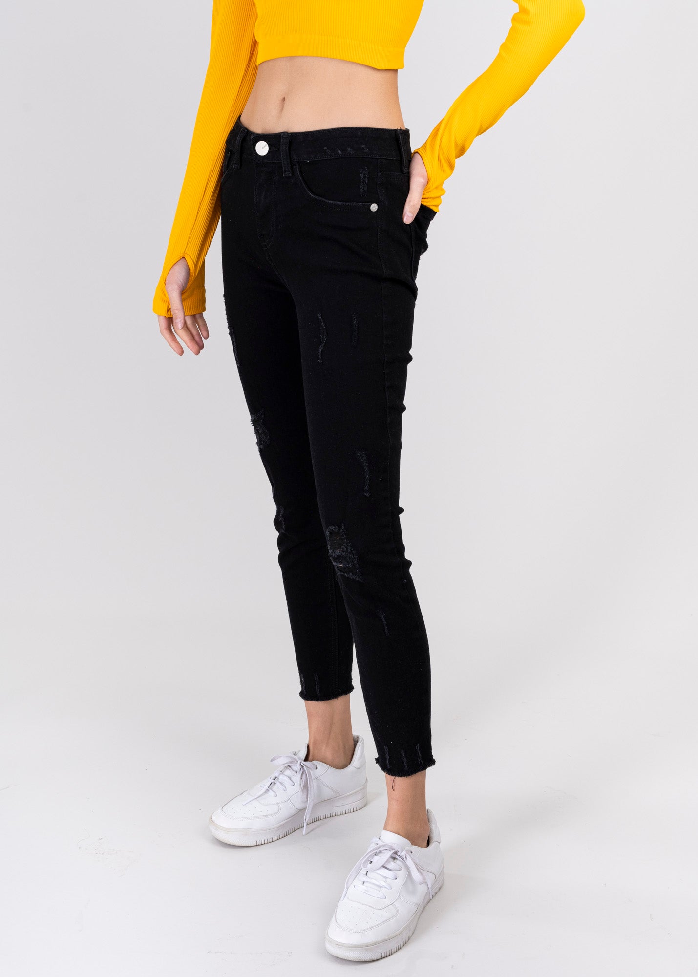 Jeans cintura media destrucciones flecos NEGRO