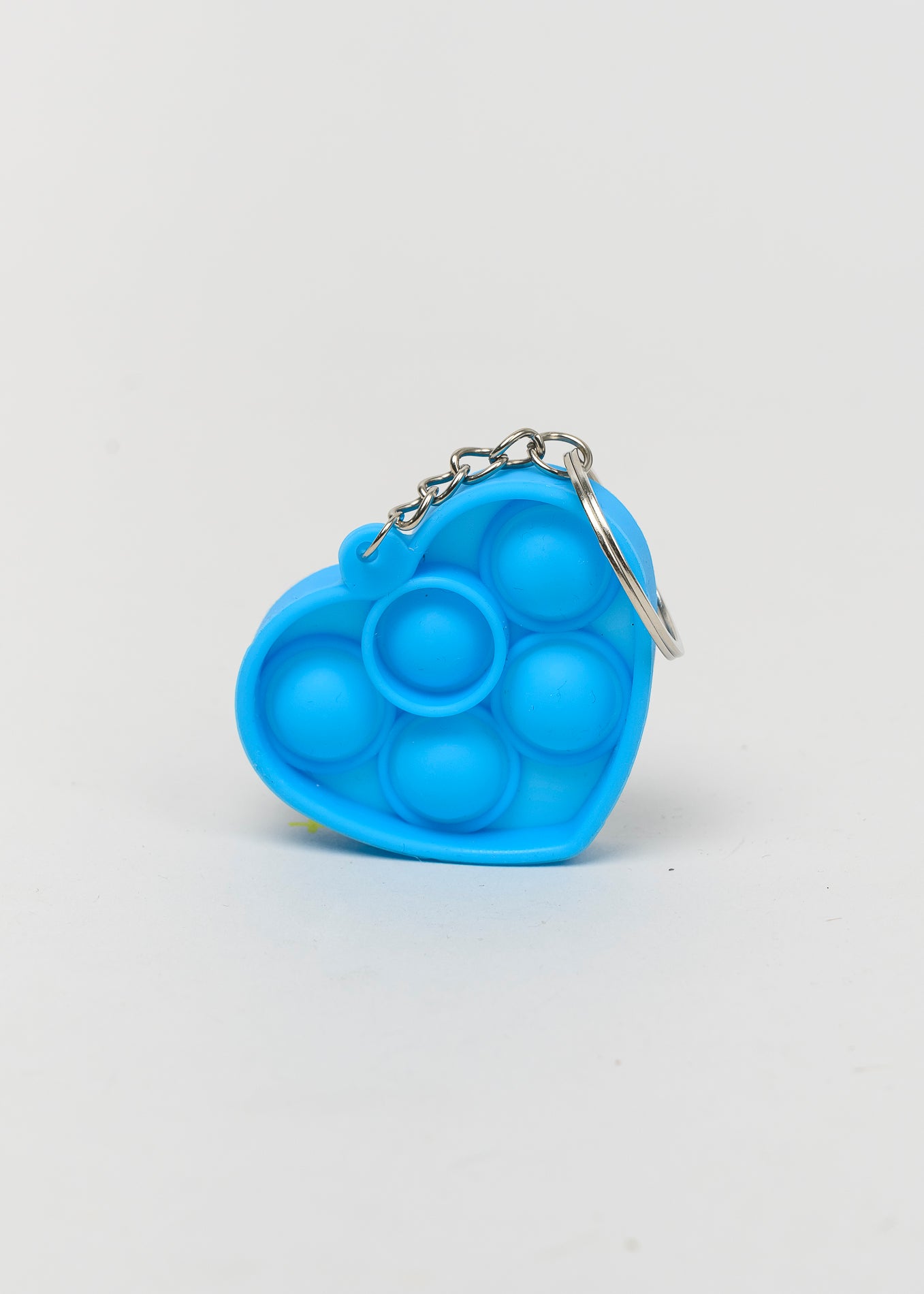 Llavero antiestrés corazón burbujas apachurrables AZUL