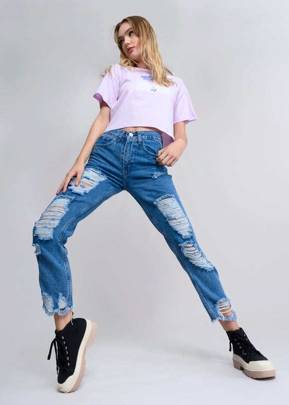 Jeans mom cintura media destrucción flecos