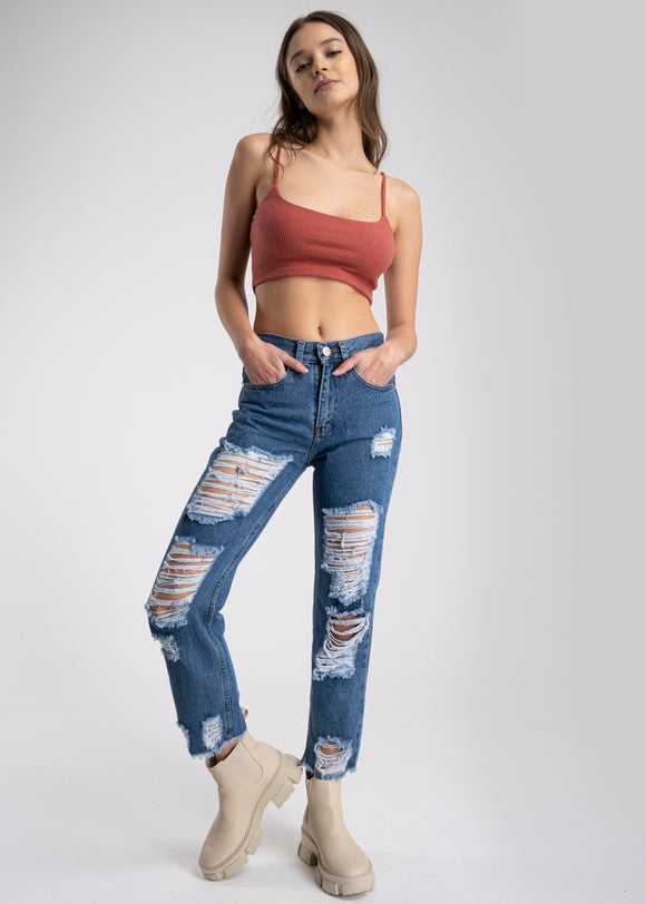 Jeans mom cintura media destrucción flecos