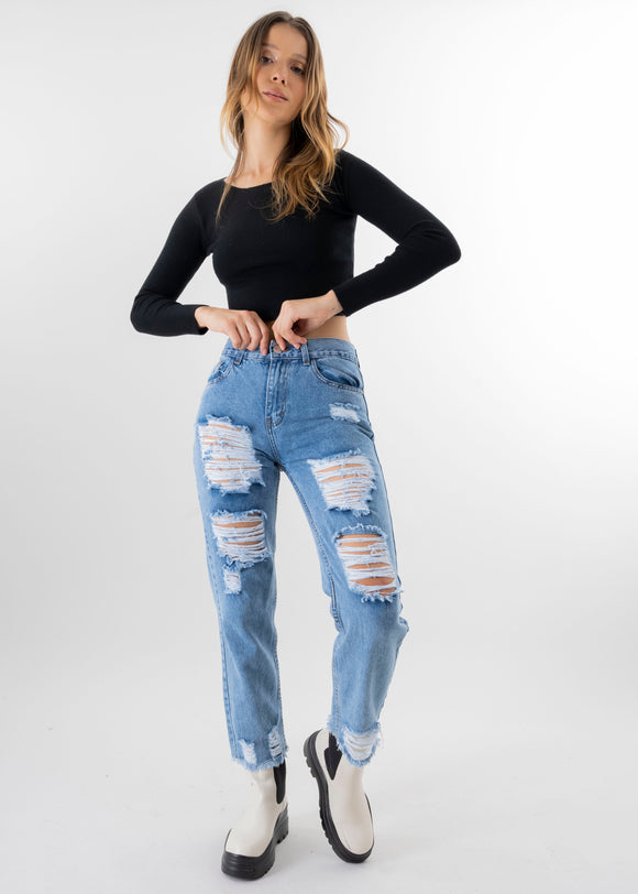 Jeans mom cintura media destrucción flecos
