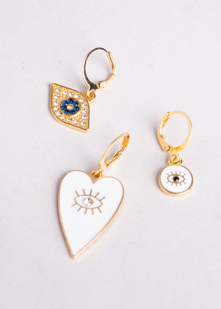 Set 3 piezas aretes ojos corazón ORO