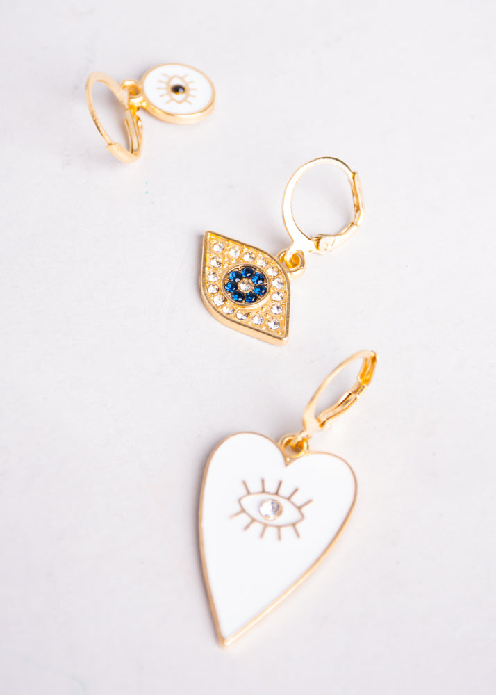 Set 3 piezas aretes ojos corazón ORO