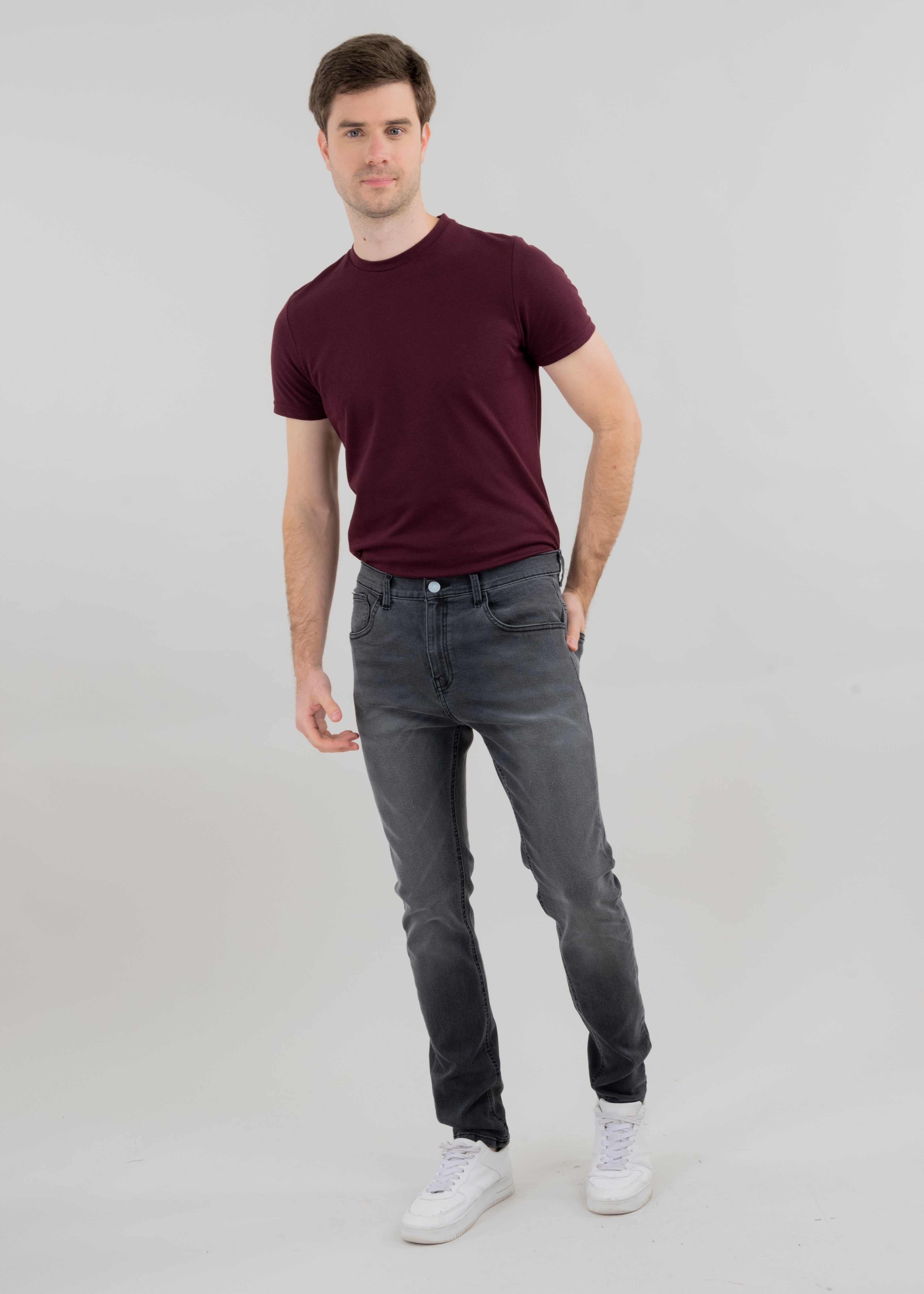 Jeans skinny deslavados GRIS