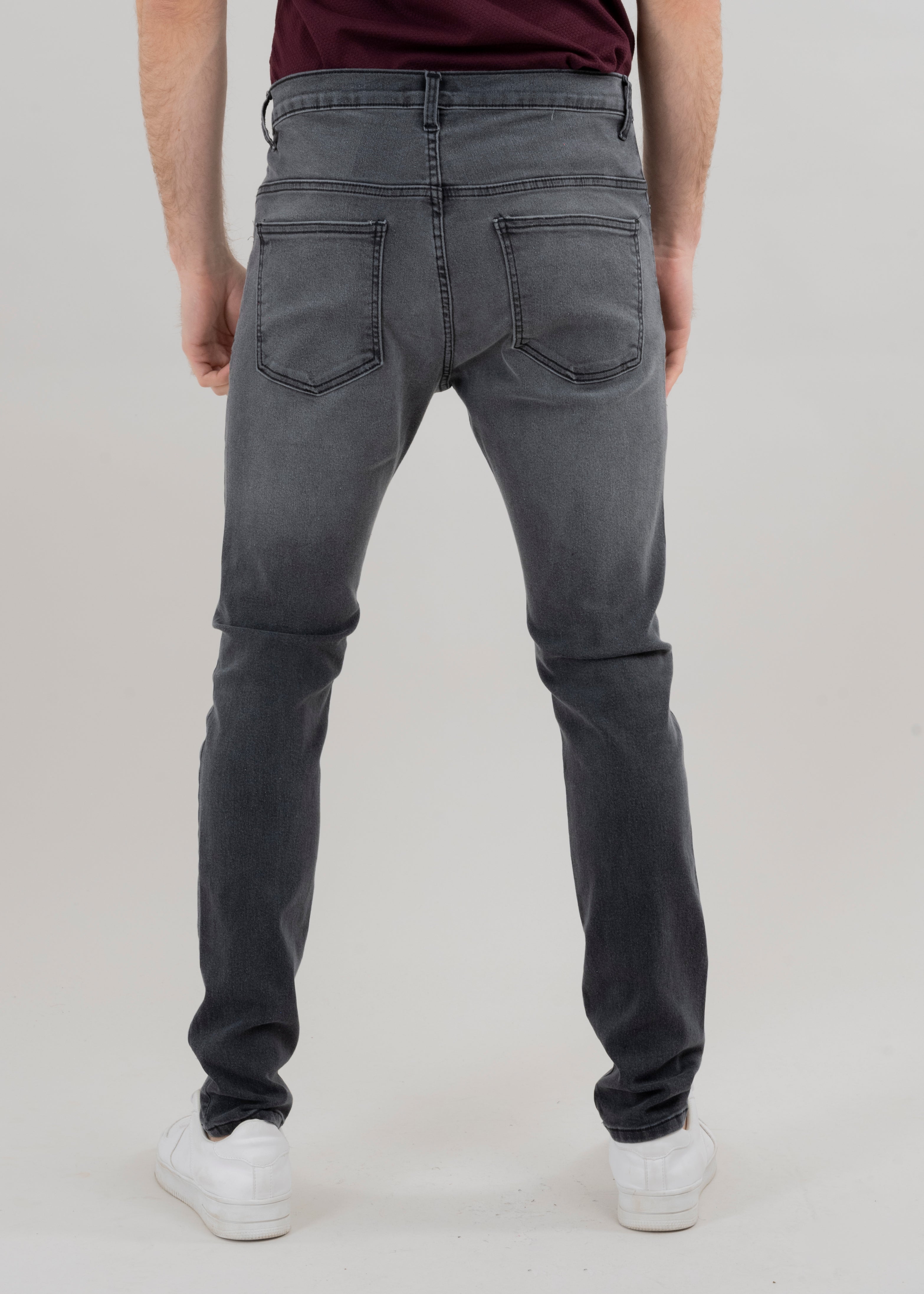 Jeans skinny deslavados GRIS
