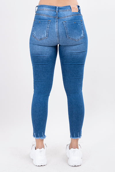 Jeans skinny con parches en rodillas MEDIUM WASH