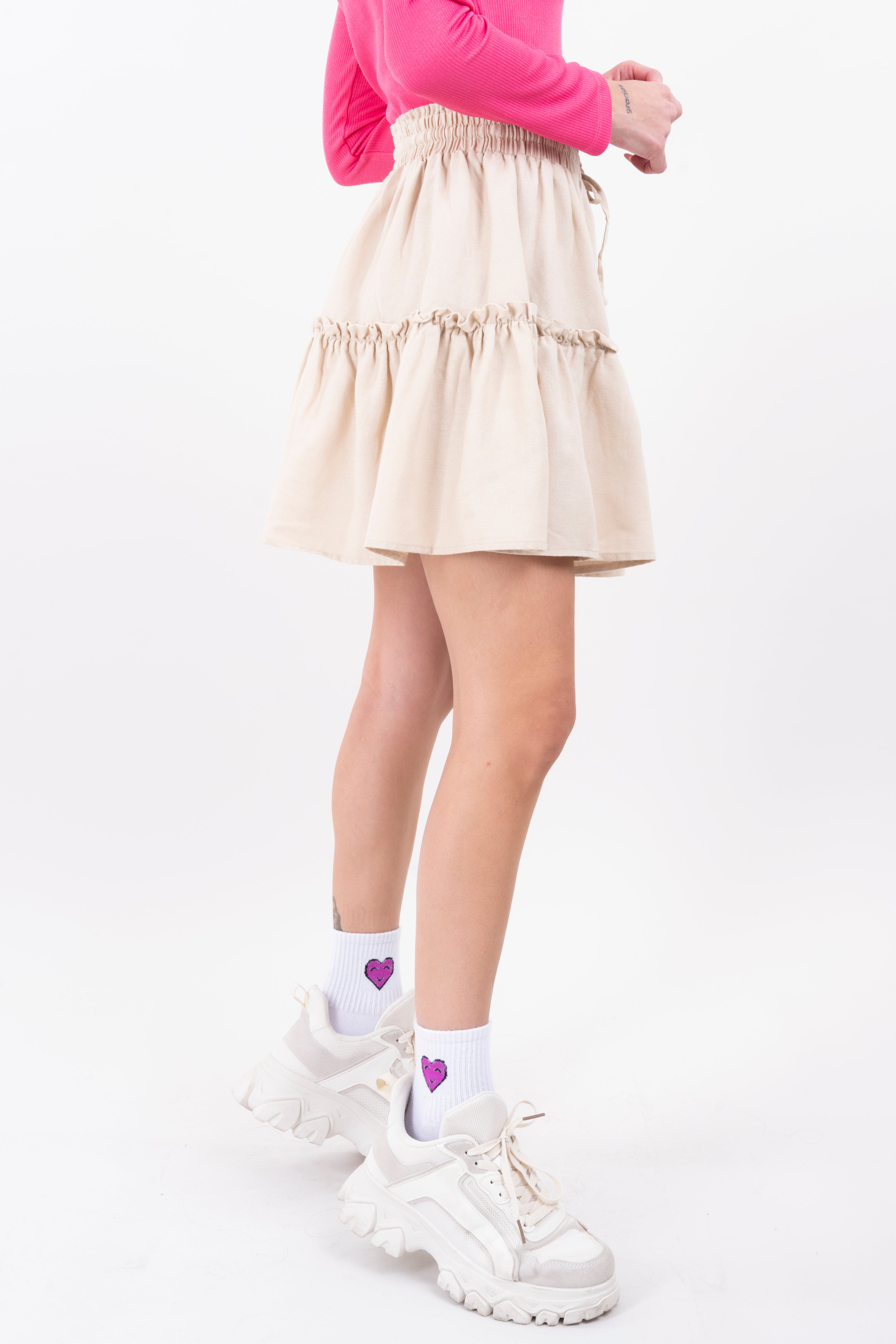 Falda mini cintura elástica olanes