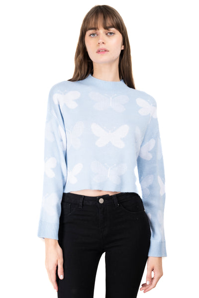 Suéter tejido mariposas