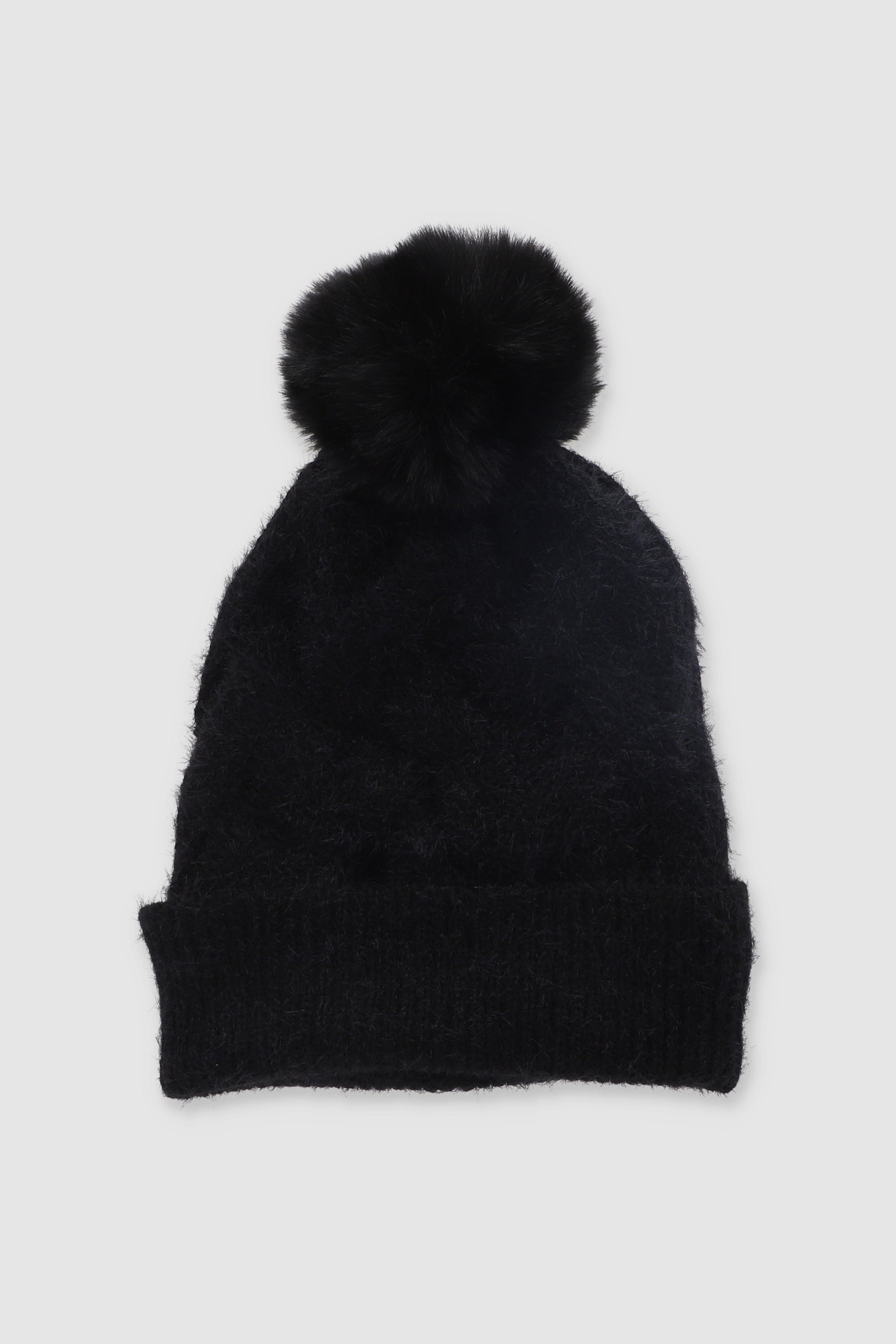 Gorro tejido pompón