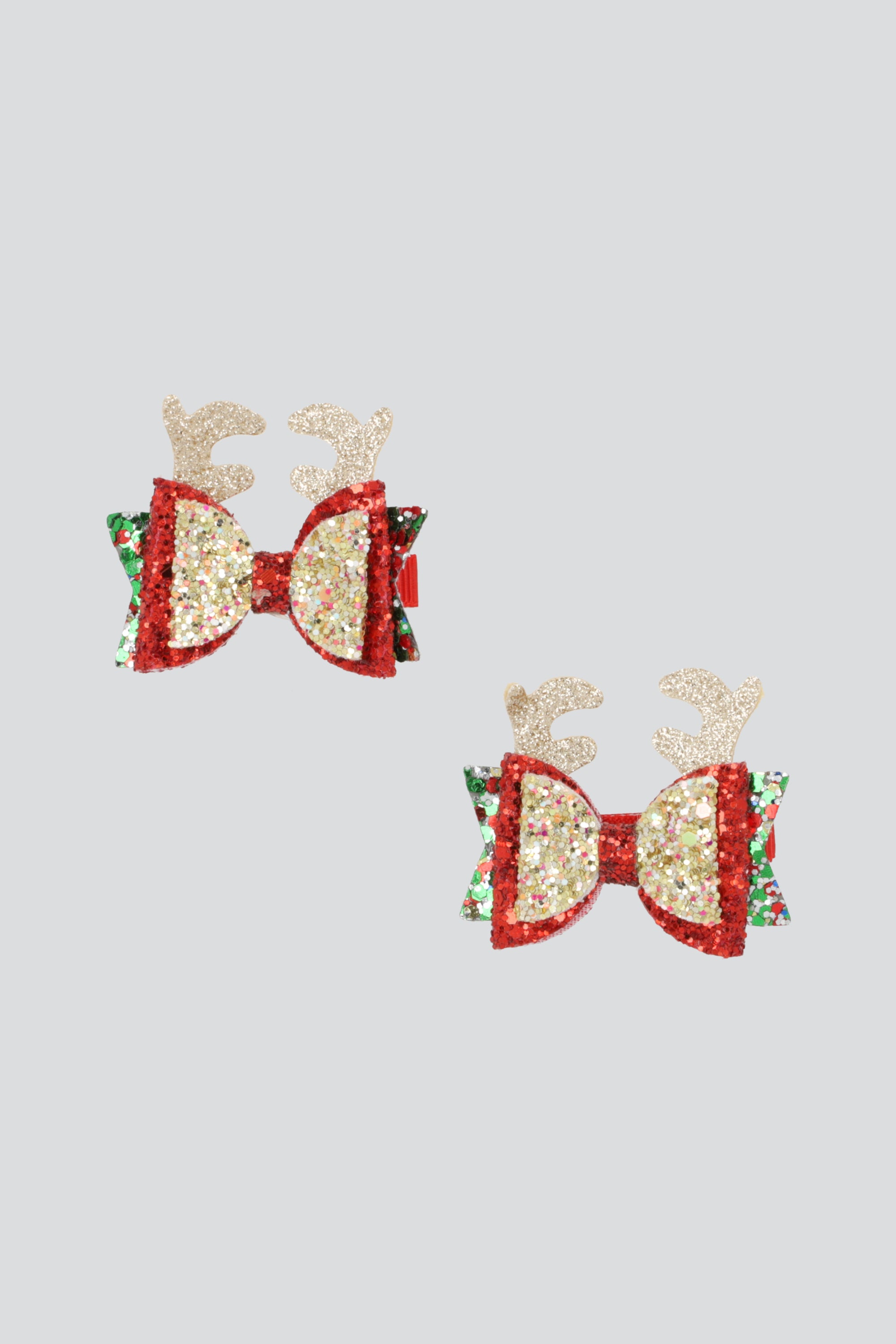 Broches moño cuernos glitter ORO