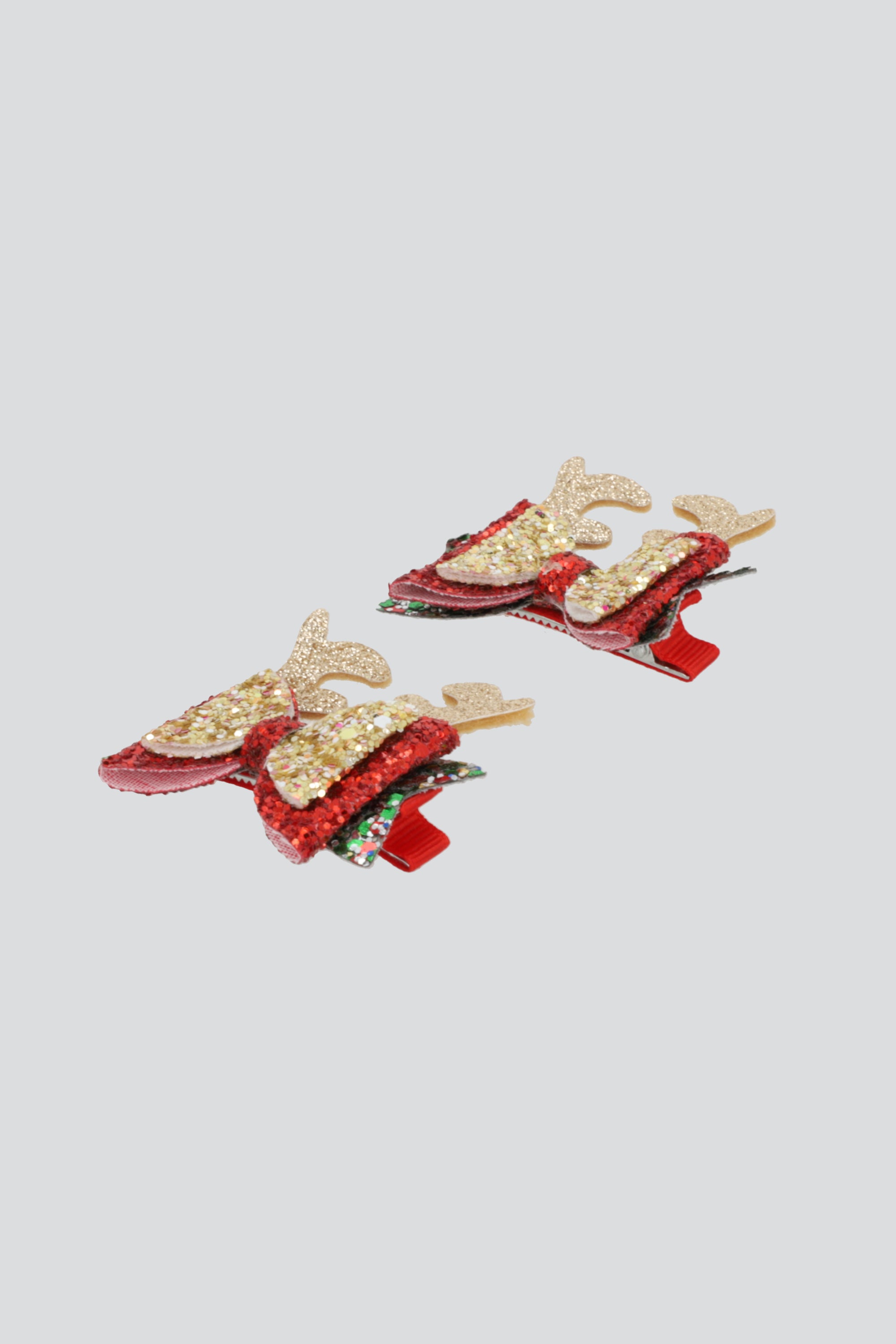Broches moño cuernos glitter ORO