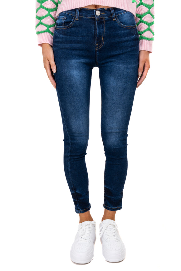 Jeans skinny con detalle en tobillo