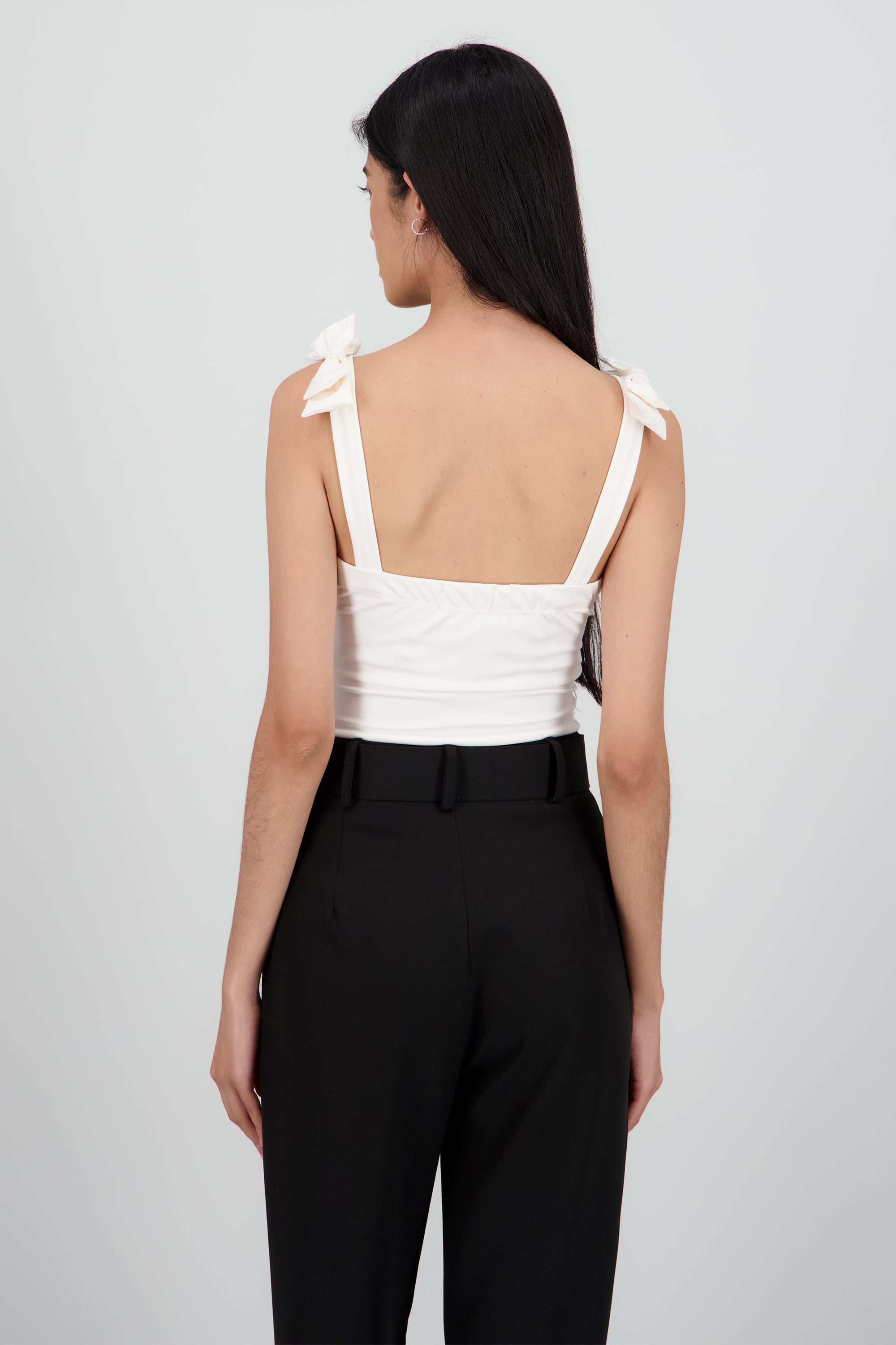 Bodysuit Liso Con Tirante Moños Hypsters HUESO