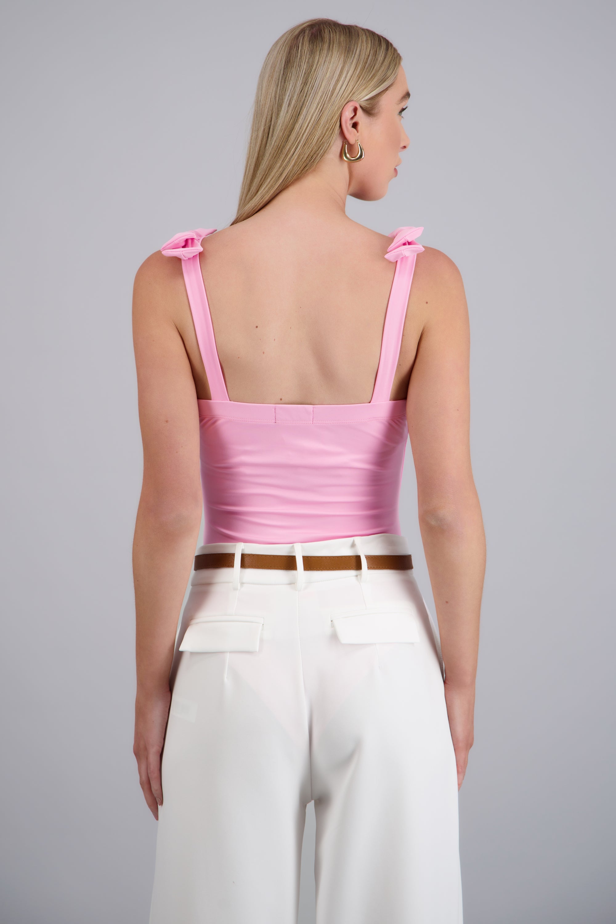 BODYSUIT LISO C/TIRANTE MOÑOS HYPSTERS ROSA PASTEL