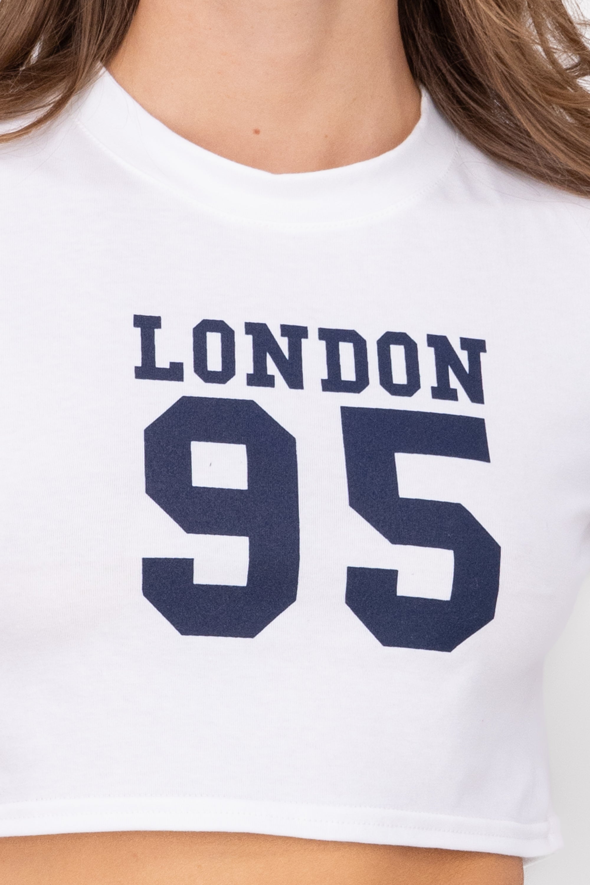 Playera cropped estampado londres BLANCO COMBO