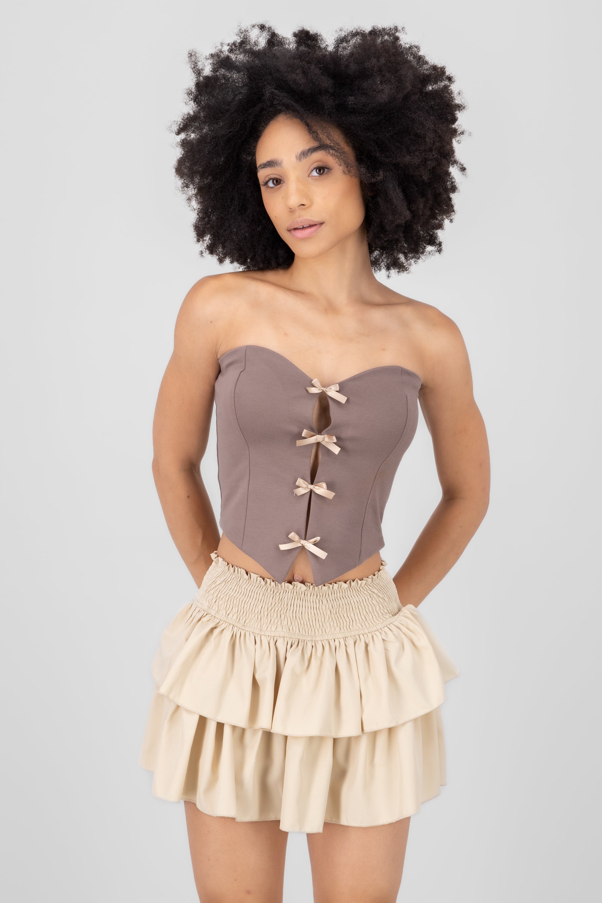 Top strapless detalle moños TAUPE